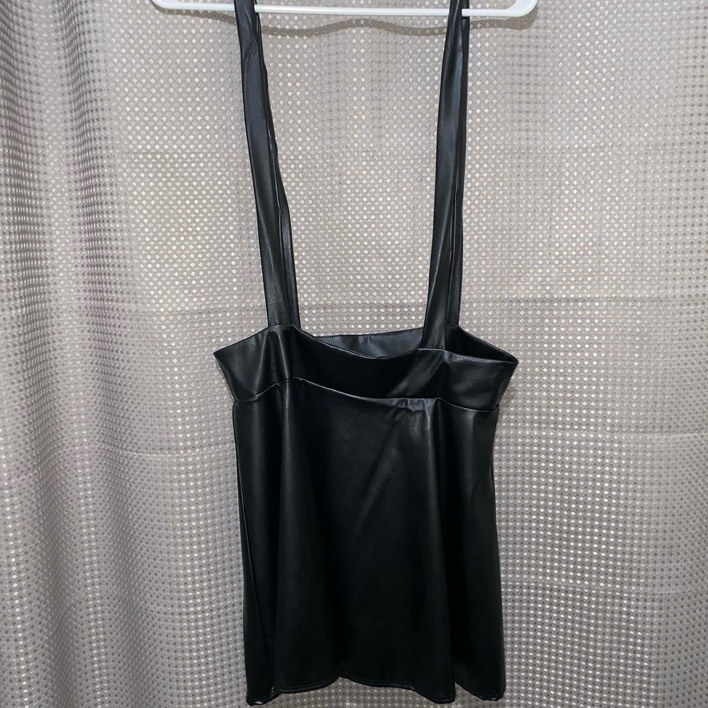 Size large black faux leather overalls skirt. Brand: Out Of Order.